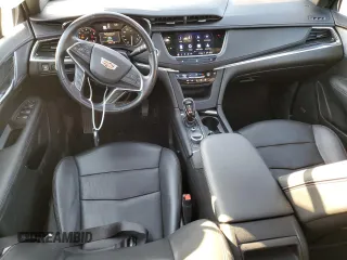 2021 Cadillac XT5 AWD Premium Luxury with VIN 1GYKNDRS6MZ111640, listed as a Copart auction lot 46567035 with 57,484 mi miles and Salvage Title. Bid and sale history available at DreamBid. Image 8.