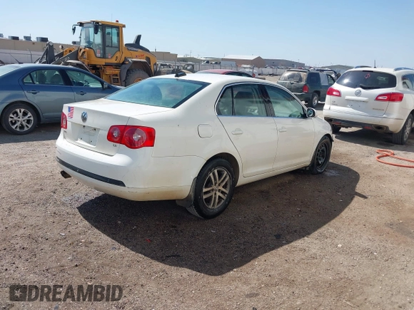 2006 Volkswagen Jetta 2.5L z VIN 3VWSF71K76M788634, wystawiony jako IAAI lot #41789391 z przebiegiem 180 683 mil mil oraz . Historia ofert i sprzedaży dostępna na DreamBid. Obrazek 4.