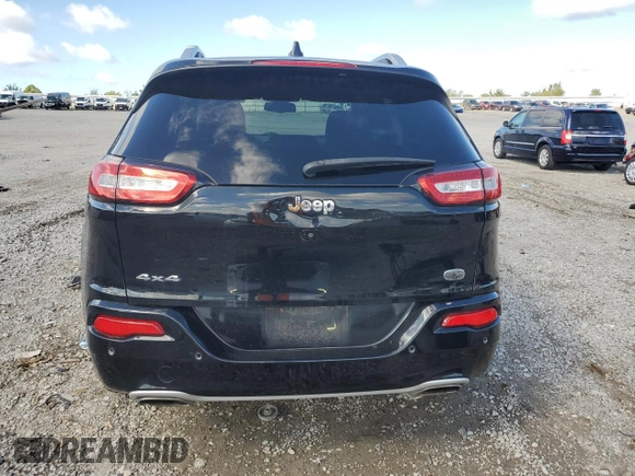 2018 Jeep Cherokee Overland with VIN 1C4PJMJX0JD594467, listed as a Copart auction lot 73963684 with 101,589 mi miles and Salvage Title. Bid and sale history available at carsss.com. Image 6.