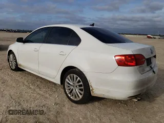 2013 Volkswagen Jetta TDI with VIN 3VWLL7AJ2DM238274, listed as a Copart auction lot 83704884 with 121,336 mi miles and Salvage title. Bid and sale history available at DreamBid. Image 2.