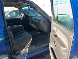 2003 Chevrolet Silverado 1500 LS with VIN 1GCEK19V73E279426, listed as a IAAI auction lot 41712046 with 205,553 mi miles. Bid and sale history available at carsss.com. Image 5.
