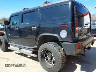 2004 Hummer H2 with VIN 5GRGN23U64H101592, listed as a IAAI auction lot 41379405 with 174,672 mi miles. Bid and sale history available at carsss.com. Image 3.