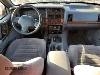 1997 Jeep Grand Cherokee Laredo with VIN 1J4GZ58S1VC511109, listed as a Copart auction lot 76798064 with 98,017 mi miles and Clean Title. Bid and sale history available at carsss.com. Image 8.