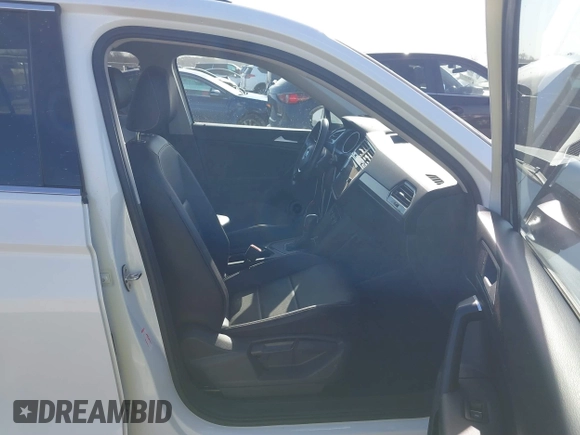 2021 Volkswagen Tiguan SE with VIN 3VV3B7AX9MM051920, listed as a IAAI auction lot 41826721 with 127,699 mi miles and . Bid and sale history available at DreamBid. Image 5.