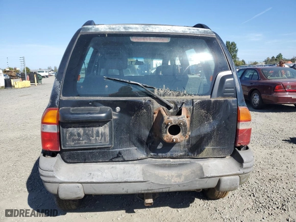 2002 Chevrolet Tracker ZR2 with VIN 2CNBJ734X26948098, listed as a Copart auction lot 73135754 with NaN miles and Salvage Title. Bid and sale history available at carsss.com. Image 6.