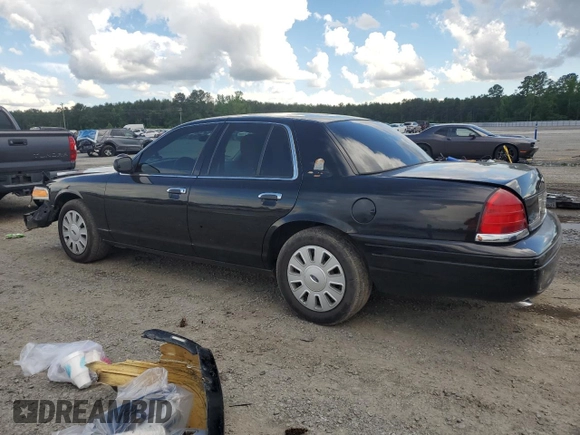 2011 Ford Police Interceptor z VIN 2FABP7BV0BX112023, wystawiony jako Copart lot #56831105 z przebiegiem 182 338 mil mil oraz Szkoda całkowita • Salvage title. Historia ofert i sprzedaży dostępna na DreamBid. Obrazek 2.