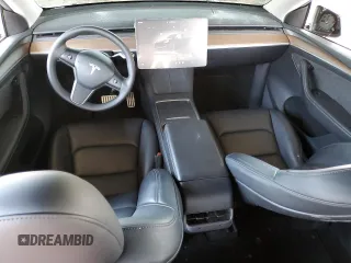 2024 Tesla Model Y Performance z VIN 7SAYGDEFXRF037934, wystawiony jako Copart lot #52126255 z przebiegiem 27 366 mil mil oraz Szkoda całkowita • Salvage title. Historia ofert i sprzedaży dostępna na DreamBid. Obrazek 8.