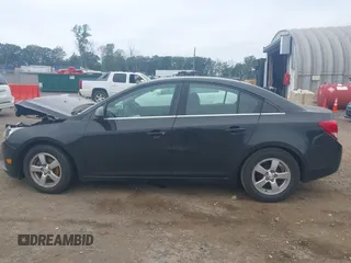 2014 Chevrolet Cruze 1LT z VIN 1G1PC5SB1E7136307, wystawiony jako IAAI lot #42544810 z przebiegiem 113 073 mil mil oraz . Historia ofert i sprzedaży dostępna na DreamBid. Obrazek 15.