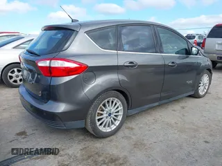 2016 Ford C-Max SEL z VIN 1FADP5CU4GL101968, wystawiony jako IAAI lot #42255922 z przebiegiem 165 358 mil mil oraz . Historia ofert i sprzedaży dostępna na DreamBid. Obrazek 4.