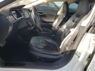 2013 Tesla Model S Performance z VIN 5YJSA1DP1DFP20689, wystawiony jako Copart lot #63685765 z przebiegiem 218 610 mil mil oraz Szkoda całkowita • Salvage title. Historia ofert i sprzedaży dostępna na DreamBid. Obrazek 7.