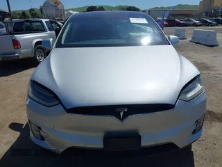 2016 Tesla Model X P90D with VIN 5YJXCAE49GF001067, listed as a IAAI auction lot 41980455 with 94,746 mi miles. Bid and sale history available at carsss.com. Image 12.