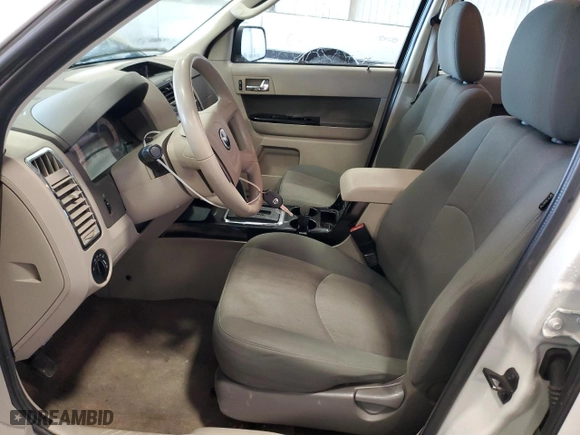 2010 Mazda Tribute Touring with VIN 4F2CY9C72AKM09576, listed as a Copart auction lot 47435435 with 159,721 mi miles and Salvage Title. Bid and sale history available at carsss.com. Image 7.