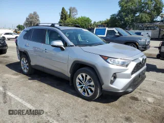 2021 Toyota RAV4 XLE Premium with VIN 2T3C1RFV4MC148429, listed as a Copart auction lot 58264395 with 26,799 mi miles and Salvage title. Bid and sale history available at DreamBid. Image 4.