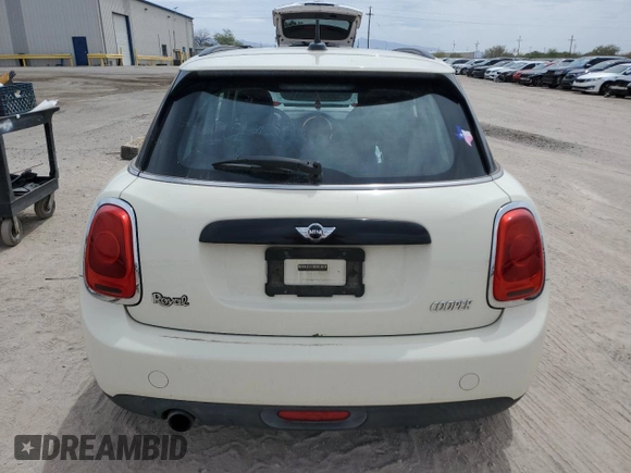 2017 MINI Hardtop 4 Door Cooper z VIN WMWXU1C53H2E17547, wystawiony jako Copart lot #56752355 z przebiegiem 51 663 mil mil oraz Szkoda całkowita • Salvage title. Historia ofert i sprzedaży dostępna na DreamBid. Obrazek 6.