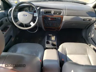 2006 Ford Taurus SEL with VIN 1FAFP56U56A121841, listed as a Copart auction lot 64722045 with 147,223 mi miles and Salvage title. Bid and sale history available at DreamBid. Image 8.