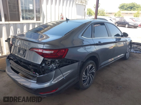 2021 Volkswagen Jetta SEL z VIN 3VWE57BU3MM032442, wystawiony jako IAAI lot #42404802 z przebiegiem 32 927 mil mil oraz . Historia ofert i sprzedaży dostępna na DreamBid. Obrazek 4.