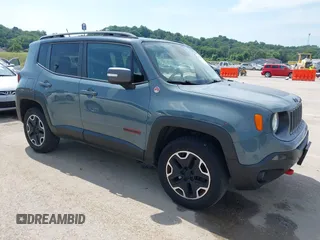 2015 Jeep Renegade Trailhawk z VIN ZACCJBCT8FPB33586, wystawiony jako IAAI lot #42590207 z przebiegiem 127 168 mil mil oraz . Historia ofert i sprzedaży dostępna na DreamBid. Obrazek 1.