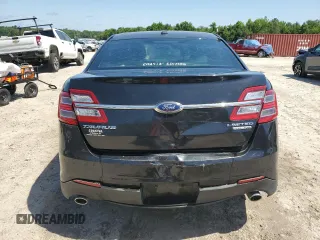 2015 Ford Taurus Limited z VIN 1FAHP2F82FG103711, wystawiony jako Copart lot #57158265 z przebiegiem 205 999 mil mil oraz Szkoda całkowita • Salvage title. Historia ofert i sprzedaży dostępna na DreamBid. Obrazek 6.