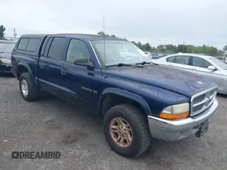 2001 Dodge Dakota Sport z VIN 1B7GG2AN41S220246, wystawiony jako IAAI lot #42361348 z przebiegiem 219 286 mil mil oraz . Historia ofert i sprzedaży dostępna na DreamBid. Obrazek 1.