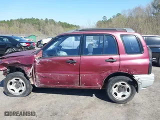 2000 Suzuki Grand Vitara with VIN JS3TE62V5Y4102944, listed as a IAAI auction lot 41782009 with 179,765 mi miles. Bid and sale history available at carsss.com. Image 15.