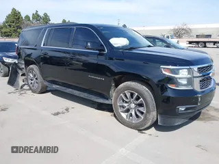 2015 Chevrolet Suburban LT z VIN 1GNSCJKC3FR238224, wystawiony jako IAAI lot #41688133 z przebiegiem 143 317 mil mil oraz . Historia ofert i sprzedaży dostępna na DreamBid. Obrazek 1.