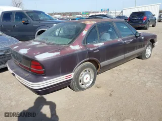 1995 Oldsmobile 88 with VIN 1G3HN52K1S4815982, listed as a IAAI auction lot 41563101 with 99,404 mi miles. Bid and sale history available at carsss.com. Image 4.