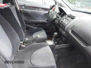 2007 Honda Fit Sport z VIN JHMGD38697S008821, wystawiony jako IAAI lot #42344743 z przebiegiem 136 805 mil mil oraz . Historia ofert i sprzedaży dostępna na DreamBid. Obrazek 5.