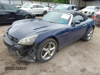 2009 Saturn Sky Red Line z VIN 1G8MT35X09Y105064, wystawiony jako IAAI lot #42197028 z przebiegiem 106 673 mil mil oraz . Historia ofert i sprzedaży dostępna na DreamBid. Obrazek 2.