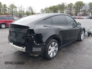 2022 Tesla Model Y Performance with VIN 7SAYGDEF7NF403701, listed as a IAAI auction lot 41961532 with 83,728 mi miles and . Bid and sale history available at DreamBid. Image 4.