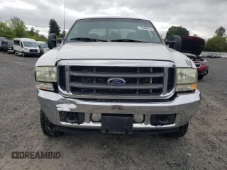 2002 Ford F-350 XL with VIN 3FTSW31F32MA17869, listed as a Copart auction lot 71828914 with 230,191 mi miles and Salvage Title. Bid and sale history available at DreamBid. Image 5.