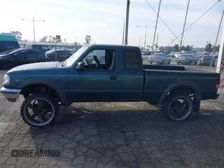 1997 Ford Ranger XLT with VIN 1FTDR15X5VPA65640, listed as a IAAI auction lot 41436818 with 212,661 mi miles. Bid and sale history available at carsss.com. Image 15.