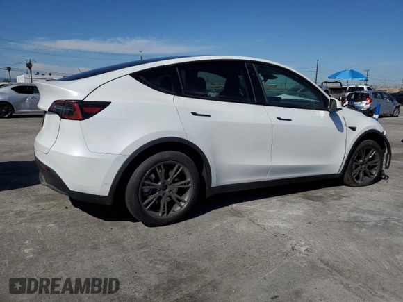 2024 Tesla Model Y with VIN 7SAYGDED5RF196309, listed as a Copart auction lot 44608545 with 7,226 mi miles and Salvage Title. Bid and sale history available at DreamBid. Image 3.