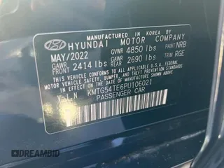 2023 Genesis G70 3.3T with VIN KMTG54TE6PU106021, listed as a Copart auction lot 86750284 with 8,669 mi miles and Salvage Title. Bid and sale history available at DreamBid. Image 10.