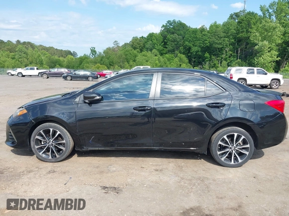2019 Toyota Corolla L with VIN 5YFBURHE1KP923291, listed as a IAAI auction lot 42173538 with 60,184 mi miles and . Bid and sale history available at DreamBid. Image 14.
