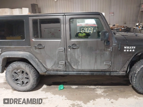 2016 Jeep Wrangler Unlimited Sport with VIN 1C4BJWDG2GL210060, listed as a IAAI auction lot 41546979 with 13,542 mi miles and . Bid and sale history available at DreamBid. Image 13.