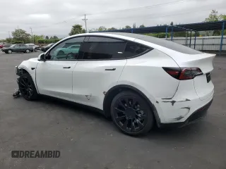 2023 Tesla Model Y Long Range with VIN 7SAYGDEEXPF744472, listed as a Copart auction lot 54109315 with 15,404 mi miles and Salvage Title. Bid and sale history available at DreamBid. Image 2.