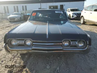 1967 Oldsmobile Cutlass z VIN 336697W359400, wystawiony jako Copart lot #77526904 z przebiegiem 60 690 mil mil oraz Szkody całkowita. Historia ofert i sprzedaży dostępna na DreamBid. Obrazek 5.