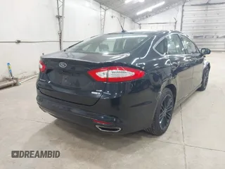 2016 Ford Fusion SE z VIN 3FA6P0T98GR111895, wystawiony jako IAAI lot #42633525 z przebiegiem 77 231 mil mil oraz . Historia ofert i sprzedaży dostępna na DreamBid. Obrazek 4.