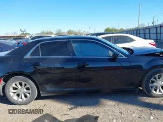 2016 Chrysler 300 Anniversary Edition with VIN 2C3CCAAGXGH261376, listed as a IAAI auction lot 41833894 with 64,489 mi miles and . Bid and sale history available at DreamBid. Image 14.