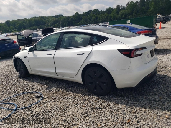 2025 Tesla Model 3 Long Range with VIN 5YJ3E1EA3SF889774, listed as a Copart auction lot 57493425 with 5,167 mi miles and Salvage title. Bid and sale history available at DreamBid. Image 2.
