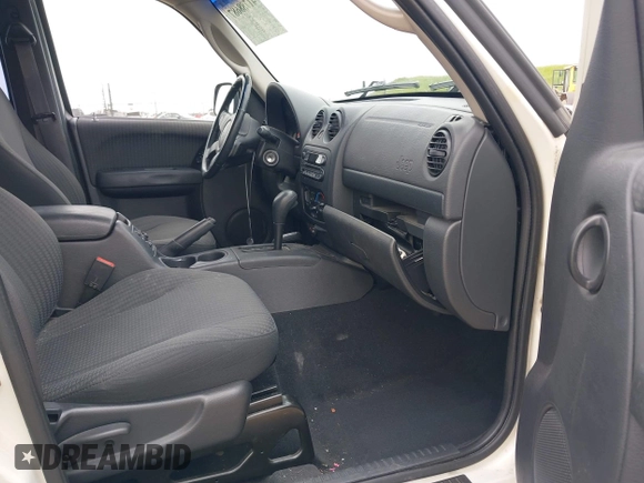 2002 Jeep Liberty Sport with VIN 1J4GL48K92W268896, listed as a IAAI auction lot 41788687 with 102,706 mi miles. Bid and sale history available at carsss.com. Image 5.