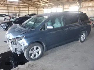 2014 Toyota Sienna LE AAS with VIN 5TDKK3DC3ES406304, listed as a Copart auction lot 54184135 with 164,658 mi miles and Salvage Title. Bid and sale history available at carsss.com. Image 1.