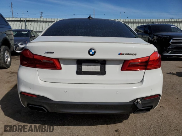 2018 BMW 5 Series M550i xDrive with VIN WBAJB9C54JB287422, listed as a Copart auction lot 46017034 with Not provided miles and Salvage title. Bid and sale history available at DreamBid. Image 6.