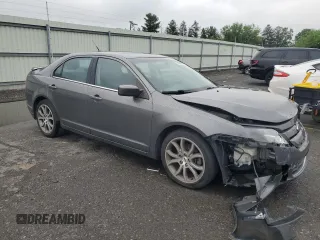 2012 Ford Fusion SE with VIN 3FAHP0HA3CR127721, listed as a Copart auction lot 64726335 with 175,332 mi miles and Salvage title. Bid and sale history available at DreamBid. Image 4.