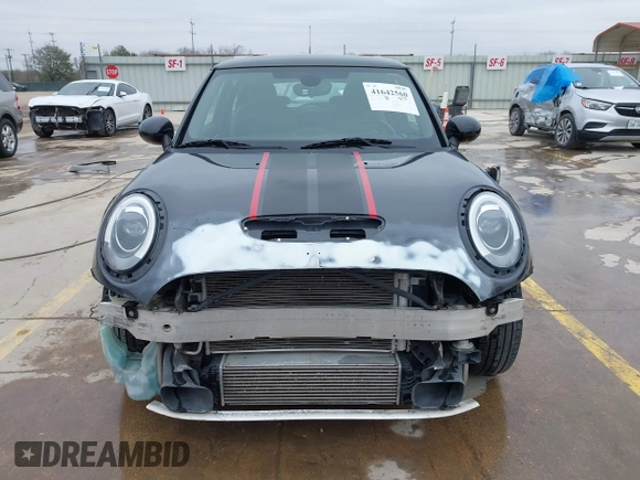 2014 MINI Hardtop S with VIN WMWXM7C56ET926604, listed as a IAAI auction lot 41642560 with 81,219 mi miles and . Bid and sale history available at DreamBid. Image 12.