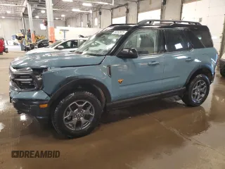 2022 Ford Bronco Sport Badlands z VIN 3FMCR9D90NRD22270, wystawiony jako Copart lot #59353975 z przebiegiem 57 983 mil mil oraz Czysty tytuł • Clean title. Historia ofert i sprzedaży dostępna na DreamBid. Obrazek 1.