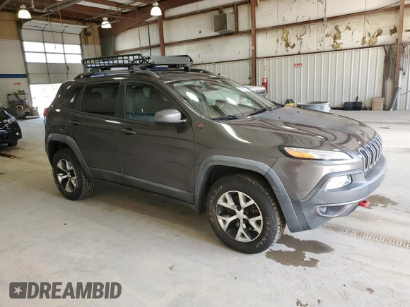2014 Jeep Cherokee Trailhawk with VIN 1C4PJMBS6EW188531, listed as a Copart auction lot 50548105 with 108,081 mi miles and Salvage Title. Bid and sale history available at carsss.com. Image 4.