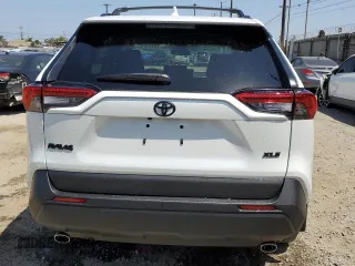2025 Toyota RAV4 XLE Premium with VIN 2T3C1RFV6SW393485, listed as a Copart auction lot 58411515 with 13 mi miles and Salvage title. Bid and sale history available at DreamBid. Image 6.