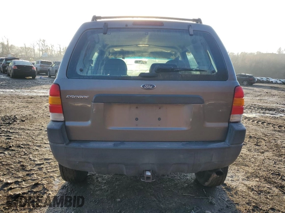 2004 Ford Escape XLS with VIN 1FMCU92134KB88319, listed as a Copart auction lot 84243494 with 158,052 mi miles and Salvage Title. Bid and sale history available at DreamBid. Image 6.