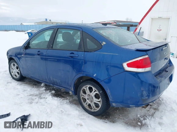2008 Ford Focus SE with VIN 1FAHP35N58W185875, listed as a IAAI auction lot 41569411 with 185,579 mi miles. Bid and sale history available at carsss.com. Image 3.
